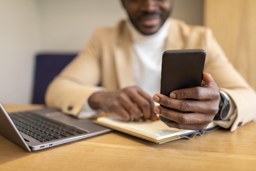 modern-african-american-man-holding a smartphone